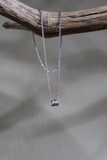 노스웍스 North Works Necklace - Twisted ring pendant